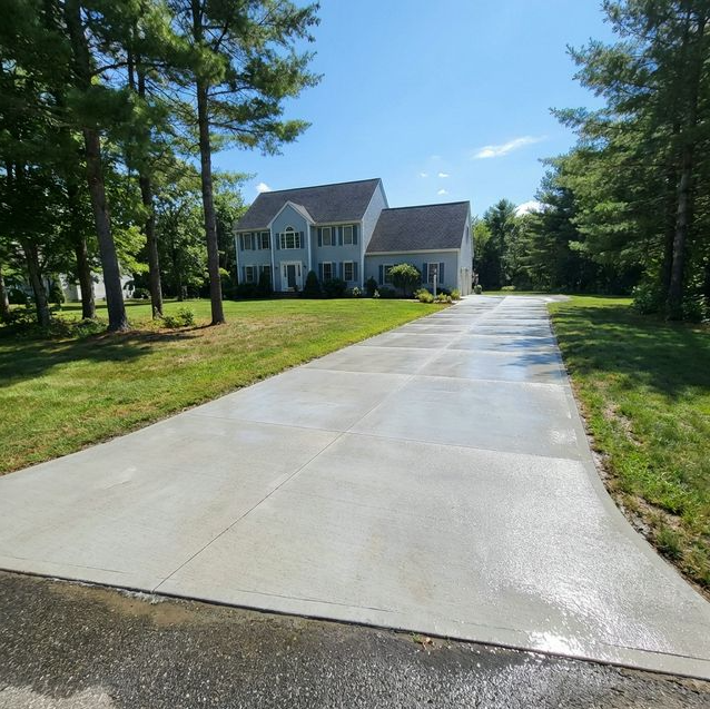 Clean driveway after power washing