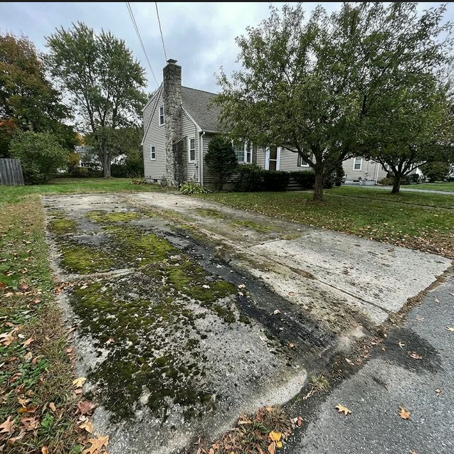 Dirty driveway before power washing